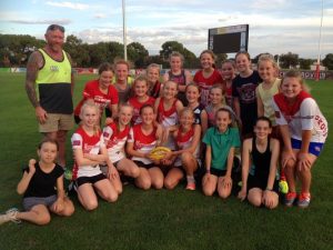 Footy girls get their kicks