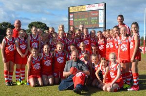 Girls’ footy takes off as sponsor signs on