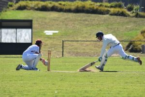 160-run stand rescues Grove