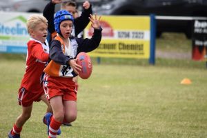 Juniors lace up the boots for round one
