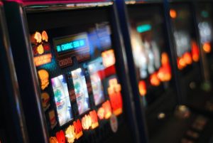 Council calls for gambling machine cap review