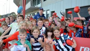 Cats star thrills youngsters during footy clinic