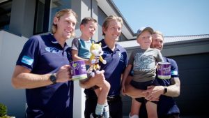 Kids visited by football greats