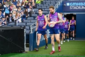 Cats veterans Hawkins, Tuohy to play on
