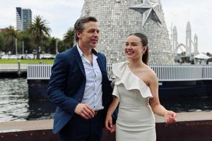 Molly and Simon take to Carols by Candlelight stage