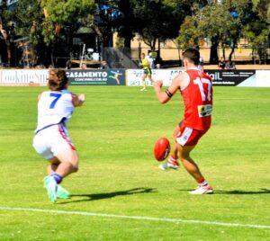 Coutas finish strongly to beat Grove in opener
