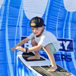 Finn Howden testing his skills on a board